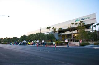 Occupy Las Vegas demonstrates in front of NV Energy, speaking out against rate increases, Wednesday Nov. 9, 2011